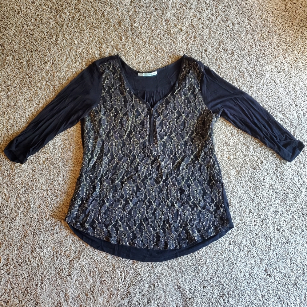 Maurices Black Zipper with Gold Patterns on it.